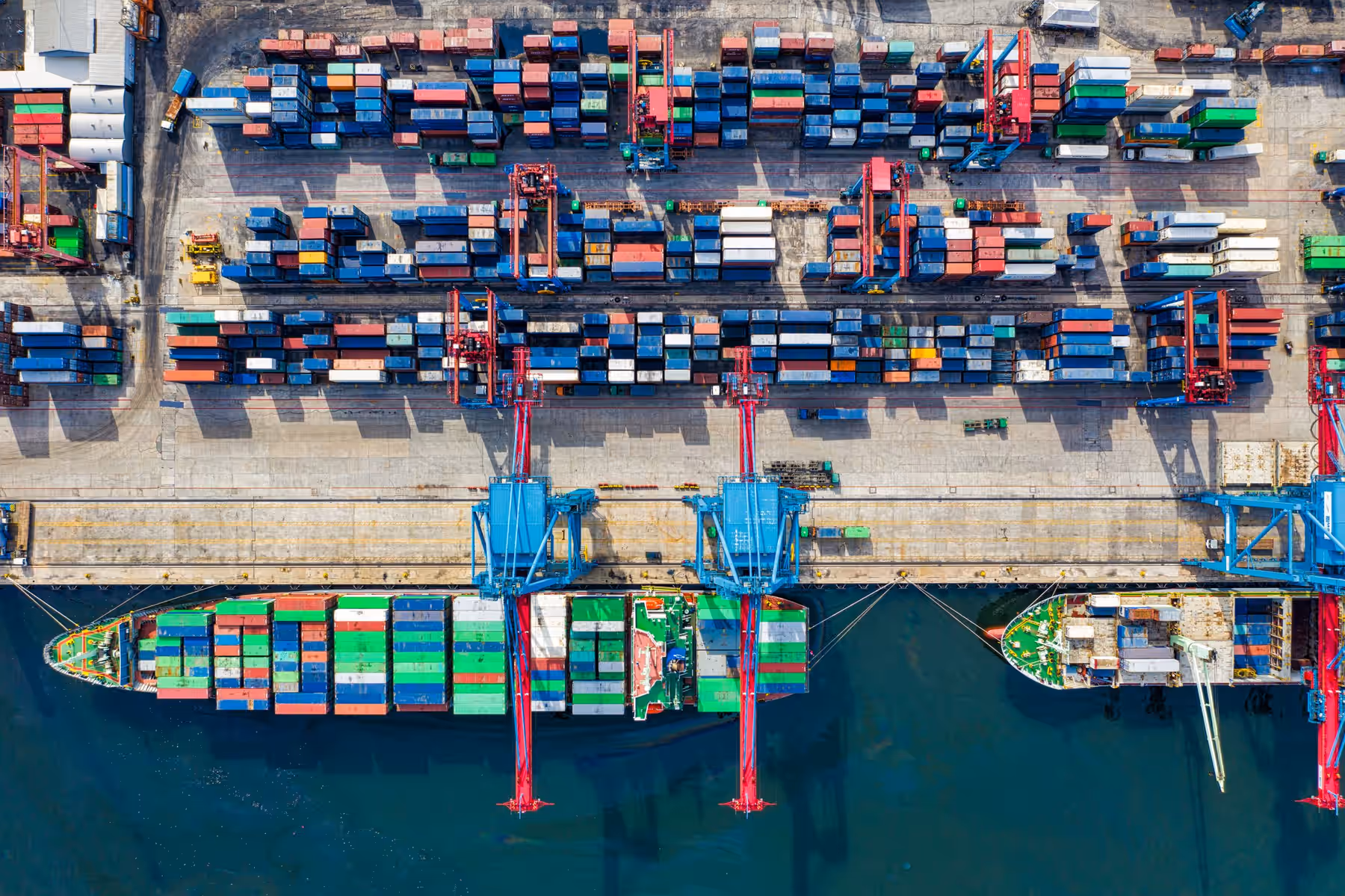 Aerial view of colourful shipping containers at a port terminal